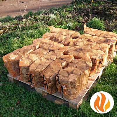 Kiln Dried hardwood logs in nets